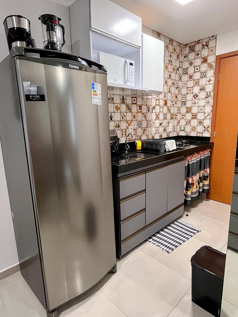 Lindo apartamento de 1 quarto e piscina no rooftop