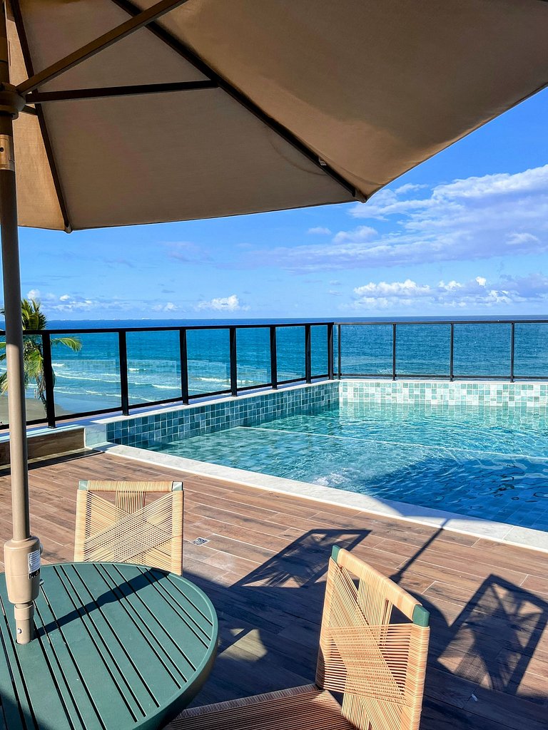Sofisticação à beira-mar, varanda com vista para a praia