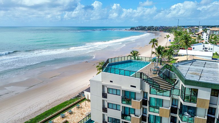 Sofisticação à beira-mar, varanda com vista para a praia