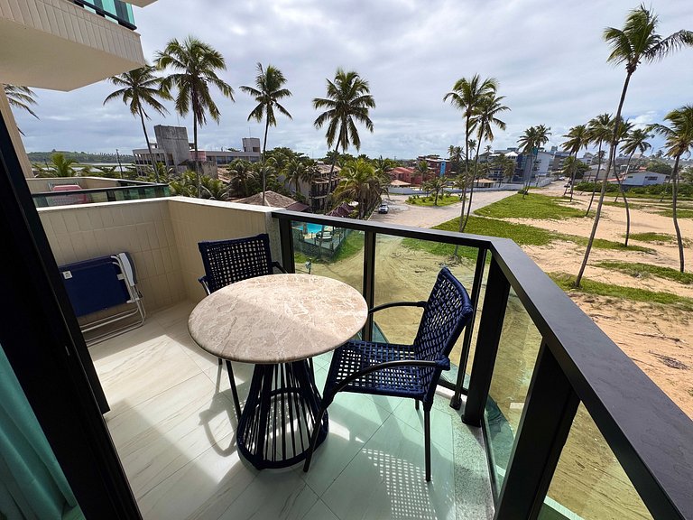 Sofisticação à beira-mar, varanda com vista para a praia