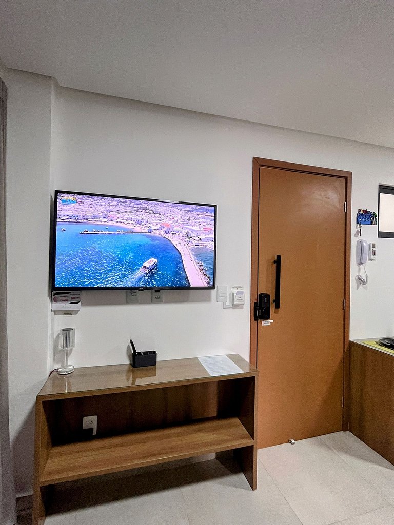 Confortável flat, 1 quarto e piscina no rooftop